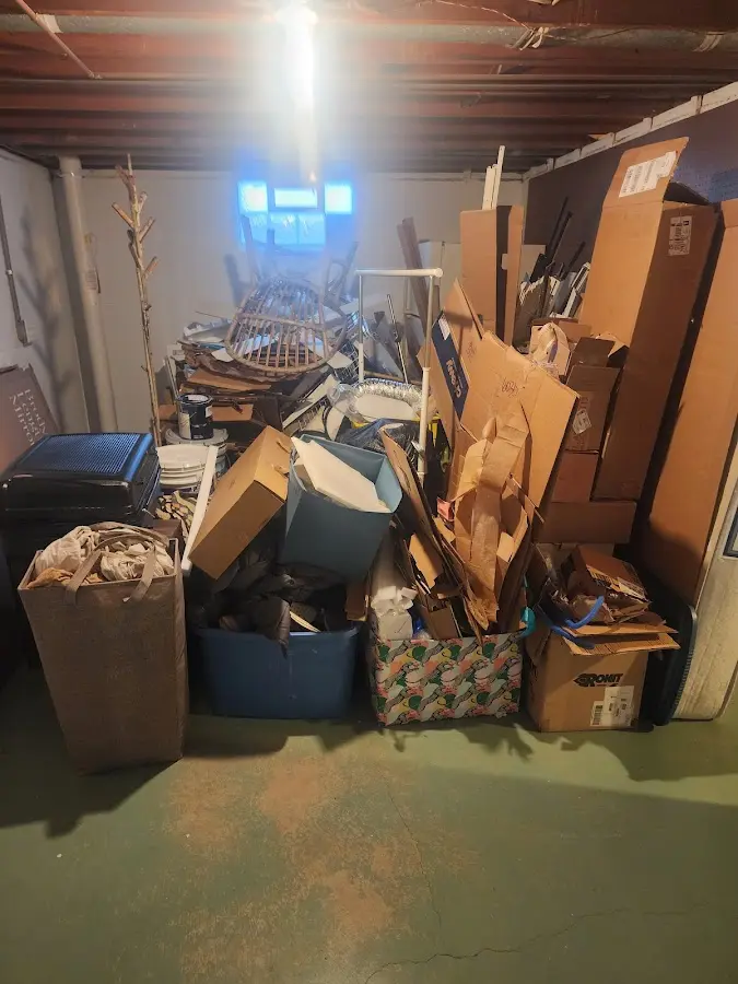 Roll-off dumpster container at job site for 2 Yard Dumpster Rental in Frankenmuth